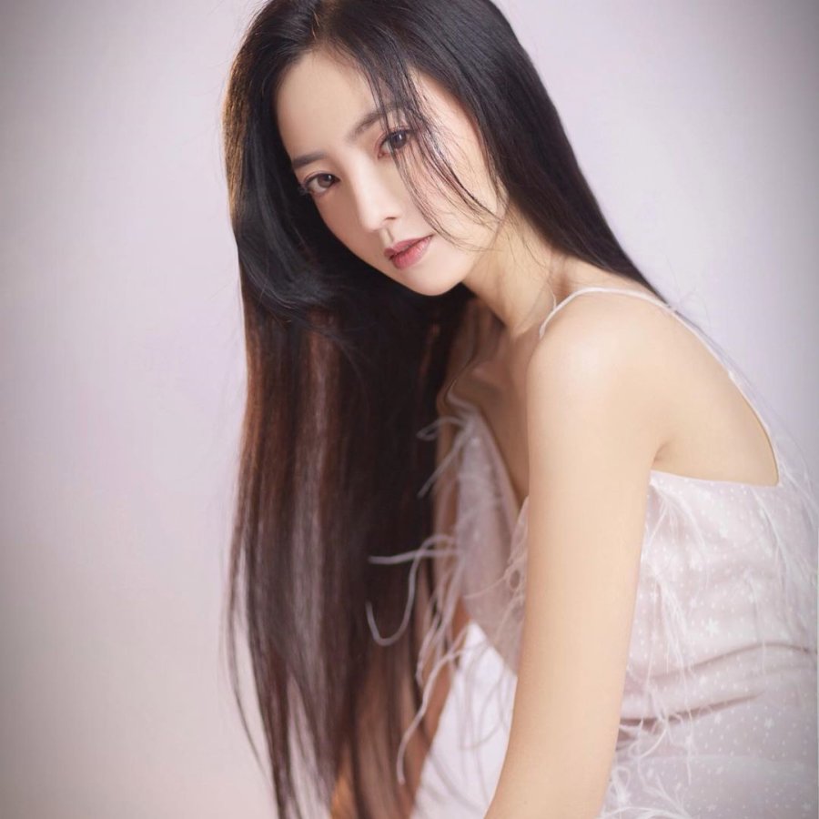 Wang Mei Xin